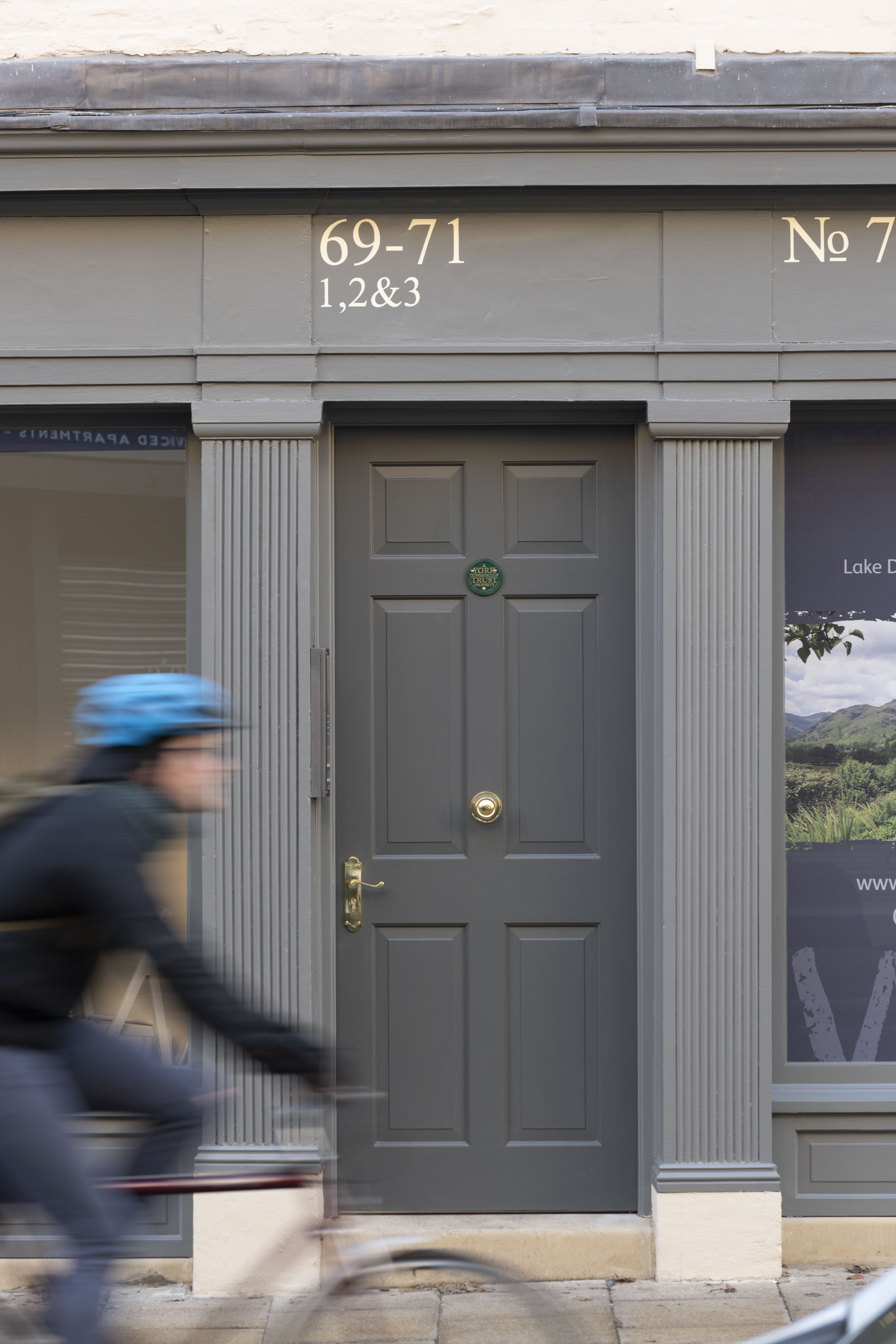No 69 Micklegate, York, door detail and cyclist | York Conservation Trust | People and place