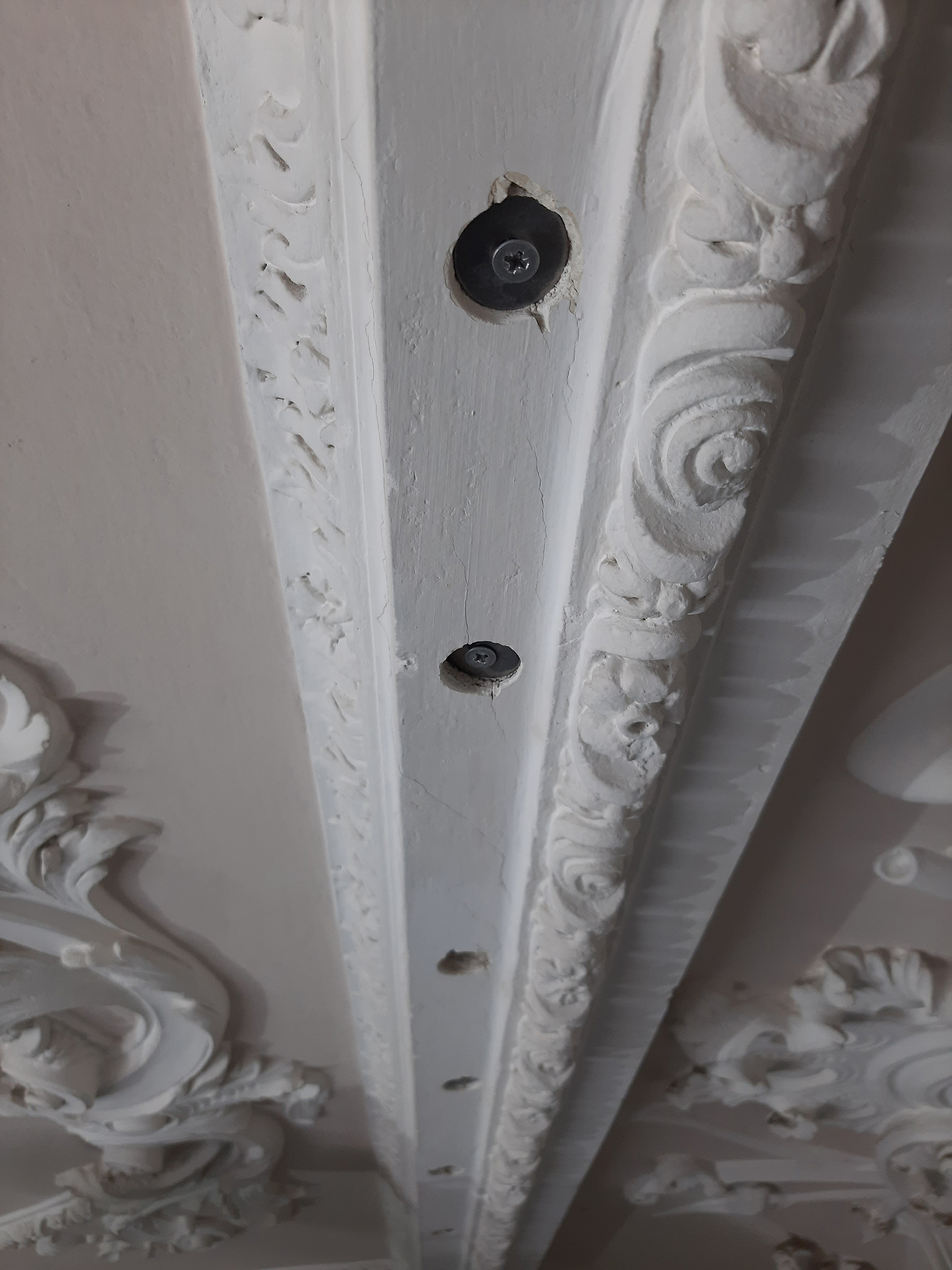 Penny washer repair technique to 1762 cornice at Fairfax House